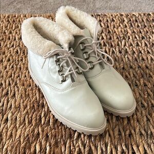 La Canadienne booties. Cream Lace-Up Booties. Rugged rubber bottom. Size 10.